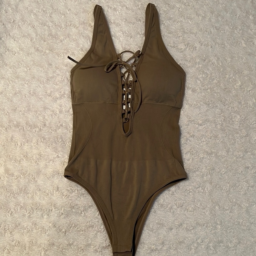 Brown center laced body suit